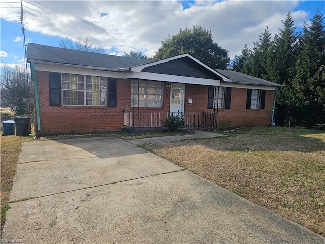 ranch-style house with a front yard