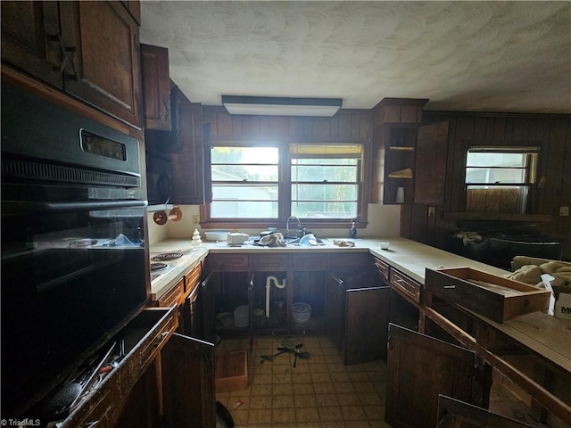 kitchen featuring stainless steel gas stovetop and oven