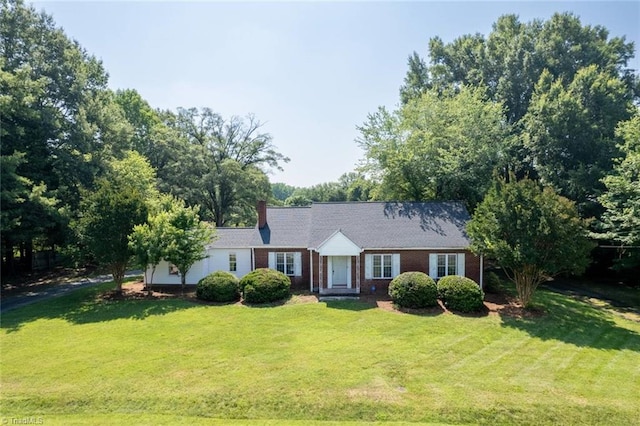 1425 Union Cross Rd, Kernersville, NC 27284 - ranch-style house featuring a front lawn, brick siding, and a chimney