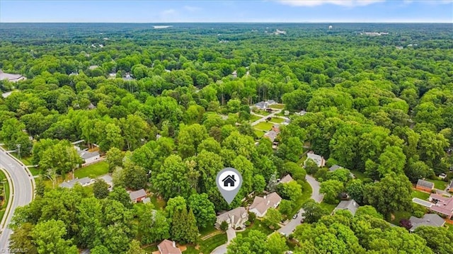 bird's eye view with a forest view