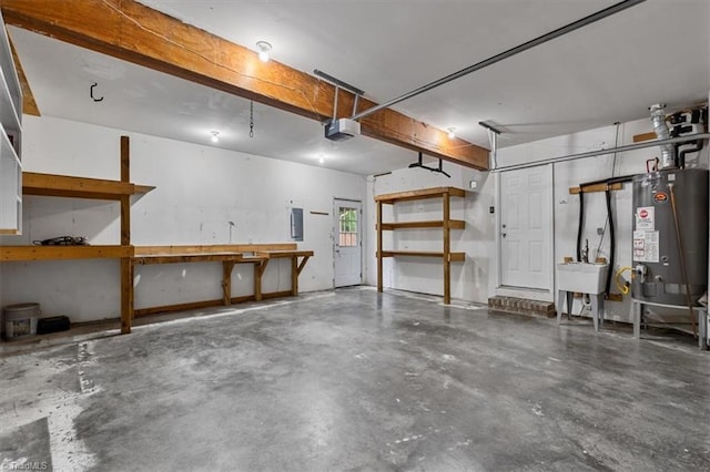 garage with water heater, a workshop area, and a garage door opener