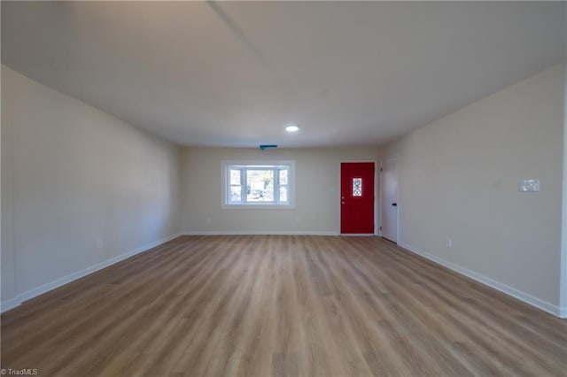 unfurnished living room with light hardwood / wood-style floors