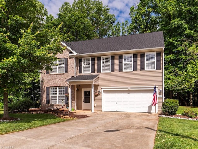 1307 Montreux Ct, Mebane, NC 27302 - view of front facade with driveway, an attached garage, and a front yard