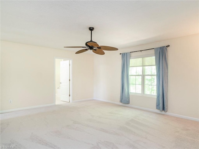 1307 Montreux Ct, Mebane, NC 27302 - spare room with light carpet, baseboards, and a ceiling fan