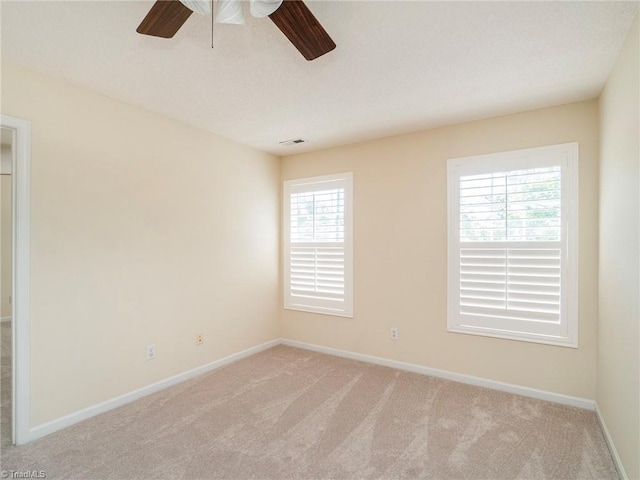 1307 Montreux Ct, Mebane, NC 27302 - empty room featuring baseboards, visible vents, ceiling fan, and carpet