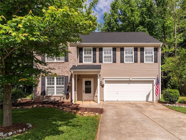 1307 Montreux Ct, Mebane, NC 27302 - traditional home featuring an attached garage, concrete driveway, and a front yard