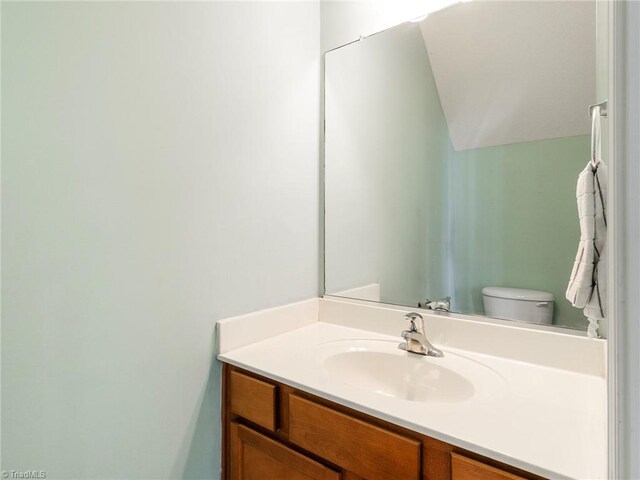 1307 Montreux Ct, Mebane, NC 27302 - half bathroom featuring toilet and vanity