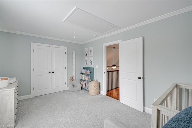 231 Plumstead Ln, Clemmons, NC 27012 - bedroom featuring attic access, carpet flooring, crown molding, baseboards, and a closet