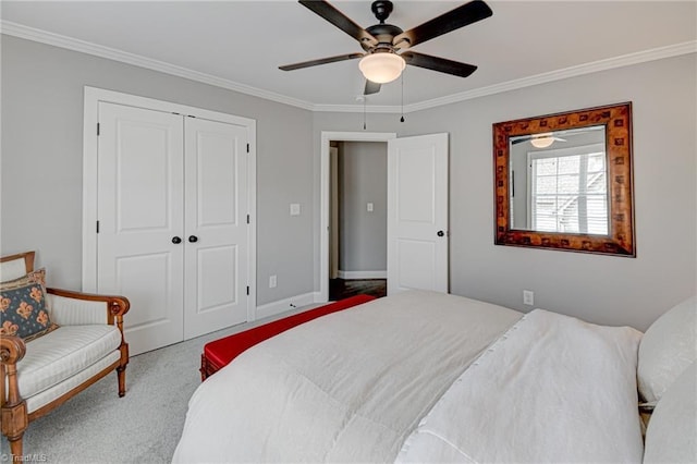 231 Plumstead Ln, Clemmons, NC 27012 - carpeted bedroom with crown molding, a closet, ceiling fan, and baseboards