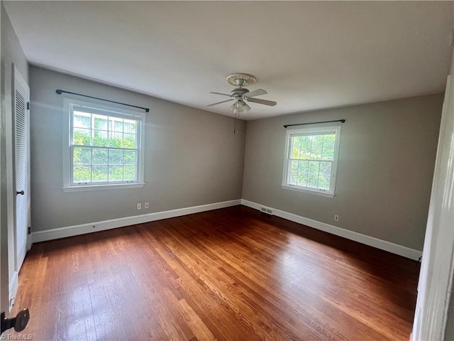 508 Audubon Dr, Greensboro, NC 27410 - unfurnished room with a ceiling fan and dark wood finished floors