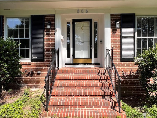 508 Audubon Dr, Greensboro, NC 27410 - view of exterior entry featuring brick siding
