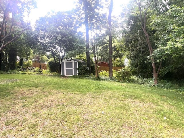 508 Audubon Dr, Greensboro, NC 27410 - view of yard featuring a shed