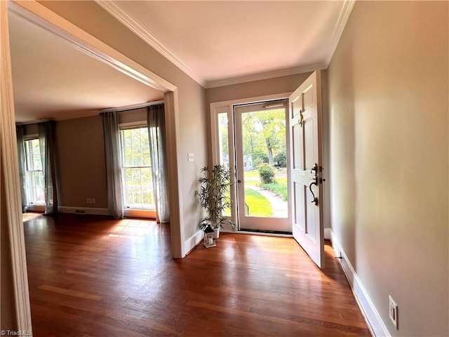 508 Audubon Dr, Greensboro, NC 27410 - foyer featuring dark wood-style floors and crown molding