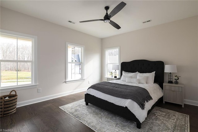 1815 Cleburne Ter, Kernersville, NC 27284 - bedroom with baseboards, dark wood finished floors, and ceiling fan