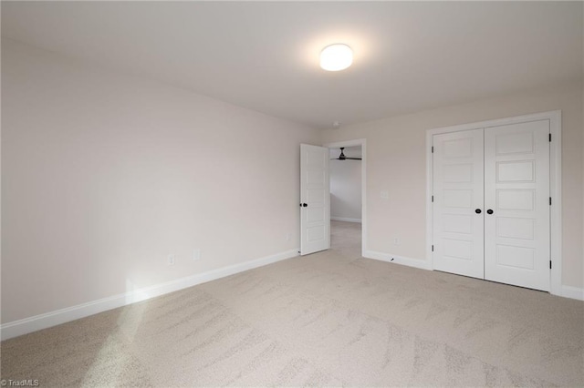 1815 Cleburne Ter, Kernersville, NC 27284 - unfurnished bedroom featuring a closet, baseboards, and carpet