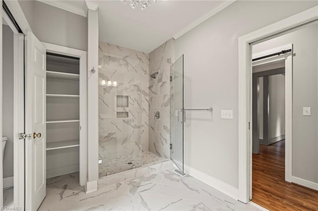 full bath with baseboards, ornamental molding, a marble finish shower, and marble finish floor