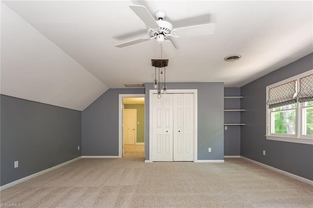 4602 Forest Glen Rd, Greensboro, NC 27410 - unfurnished bedroom featuring light colored carpet, baseboards, lofted ceiling, and a ceiling fan