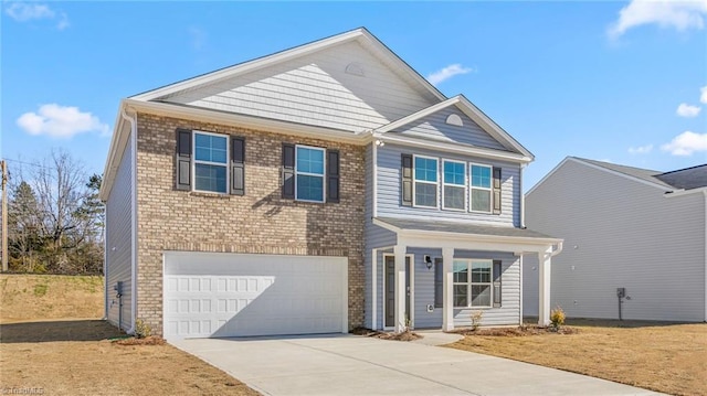 821 Merriweather Dr, King, NC 27021 - view of front of house featuring concrete driveway, an attached garage, a porch, and brick siding