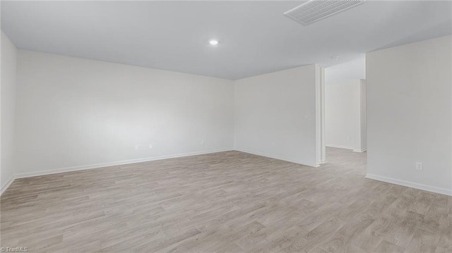 821 Merriweather Dr, King, NC 27021 - spare room featuring light wood finished floors, baseboards, and recessed lighting