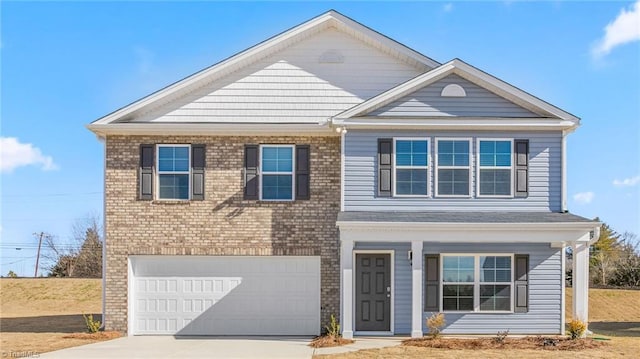 821 Merriweather Dr, King, NC 27021 - view of front facade featuring concrete driveway, a porch, a garage, and brick siding