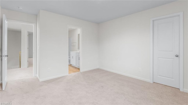821 Merriweather Dr, King, NC 27021 - unfurnished bedroom with carpet, baseboards, and ensuite bathroom