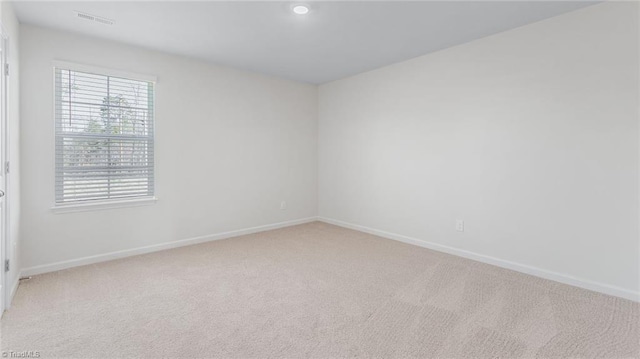 821 Merriweather Dr, King, NC 27021 - spare room featuring light colored carpet and baseboards