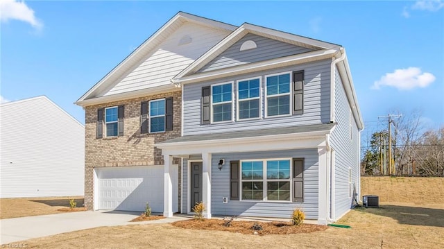 821 Merriweather Dr, King, NC 27021 - traditional-style home with an attached garage, concrete driveway, central AC unit, covered porch, and brick siding