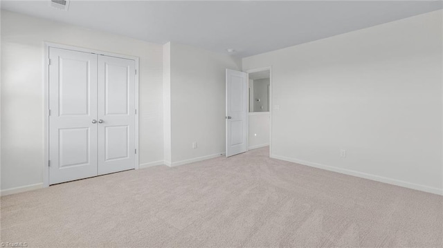 821 Merriweather Dr, King, NC 27021 - unfurnished bedroom featuring carpet floors, baseboards, and a closet