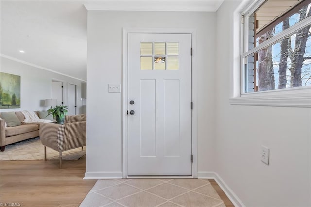 4566 Fork Rd, Norwood, NC 28128 - entrance foyer with crown molding, baseboards, and light wood-style flooring