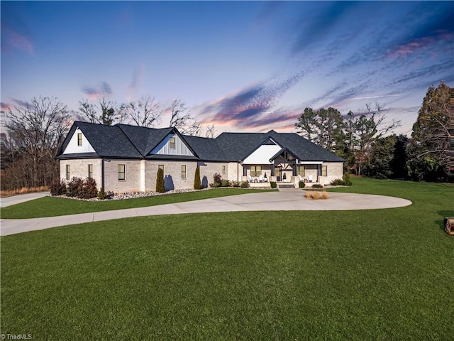 view of front of house with a yard