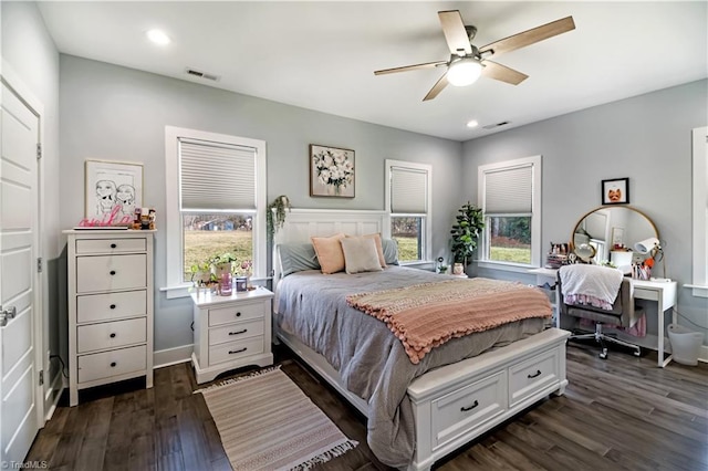 bedroom featuring dark hardwood / wood-style floors and ceiling fan