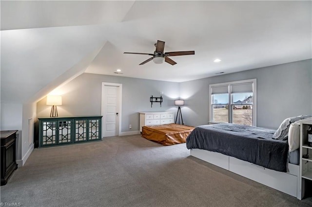 carpeted bedroom featuring vaulted ceiling and ceiling fan