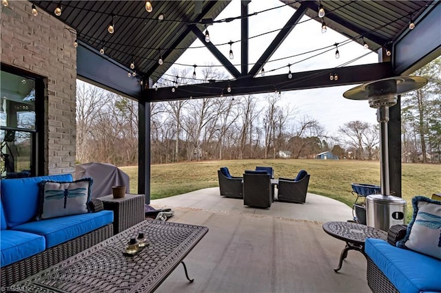 view of patio / terrace featuring a gazebo, grilling area, and an outdoor hangout area