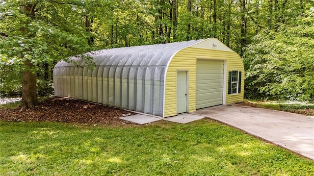 view of outbuilding with an outbuilding