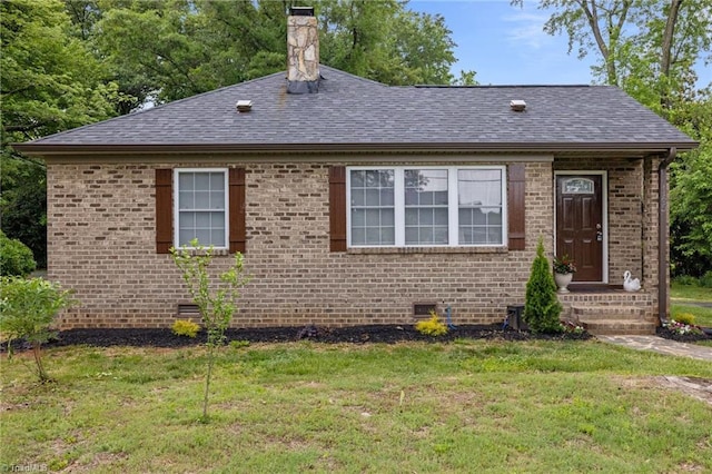 view of front facade featuring a front lawn