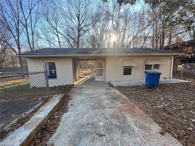 exterior space featuring a carport