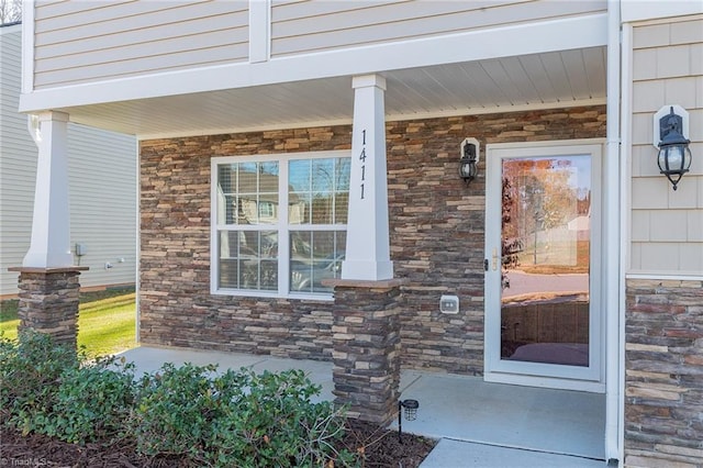 entrance to property with covered porch