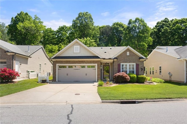 view of front of house with a garage, driveway, brick siding, and a front yard