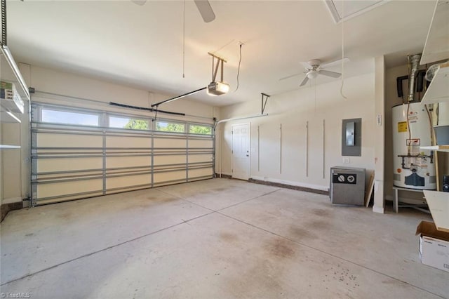 garage with a garage door opener, gas water heater, ceiling fan, and electric panel