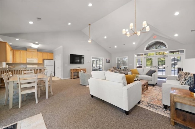 living room featuring recessed lighting and high vaulted ceiling