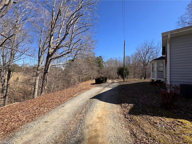 view of road featuring a view of trees