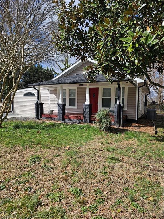 bungalow with a front yard