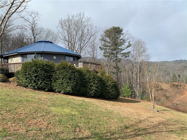 view of yard featuring a deck