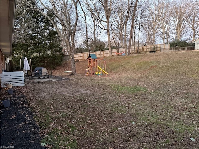 view of yard with a playground