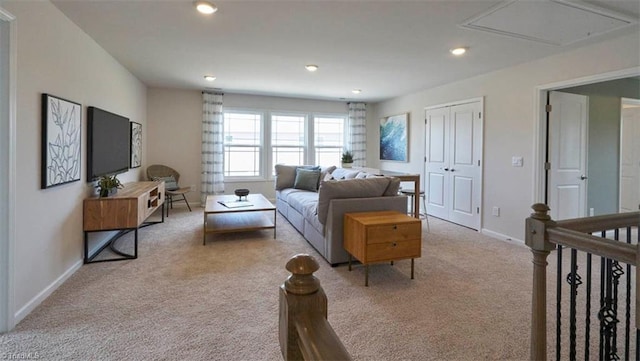 living room featuring light colored carpet