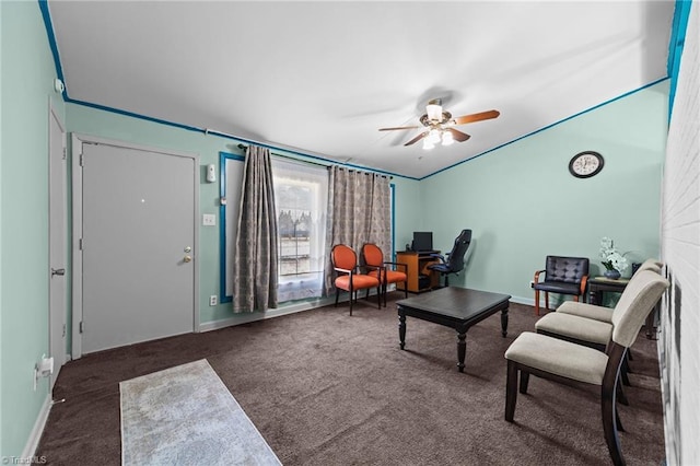 living room featuring carpet and ceiling fan