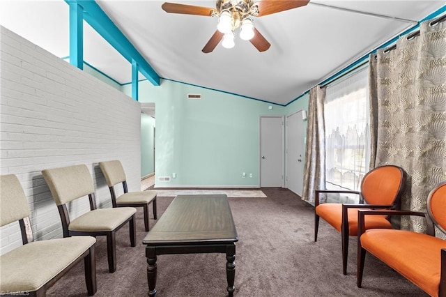 sitting room featuring carpet, lofted ceiling with beams, and ceiling fan