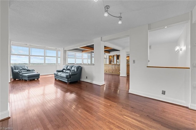 unfurnished living room with hardwood / wood-style floors