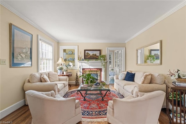 living room with dark hardwood / wood-style floors and ornamental molding