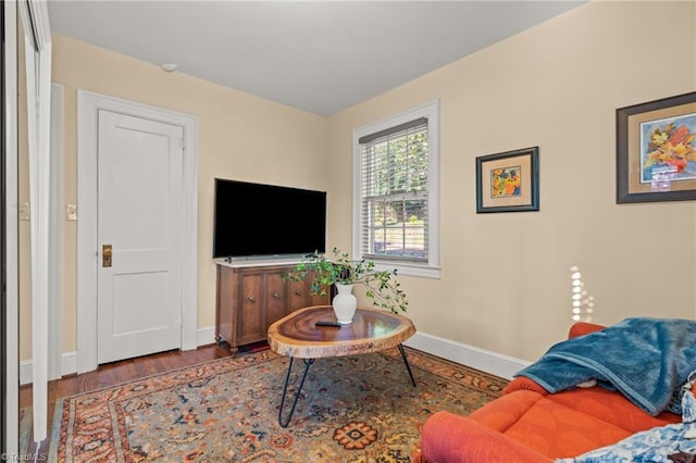 living room with dark wood-type flooring